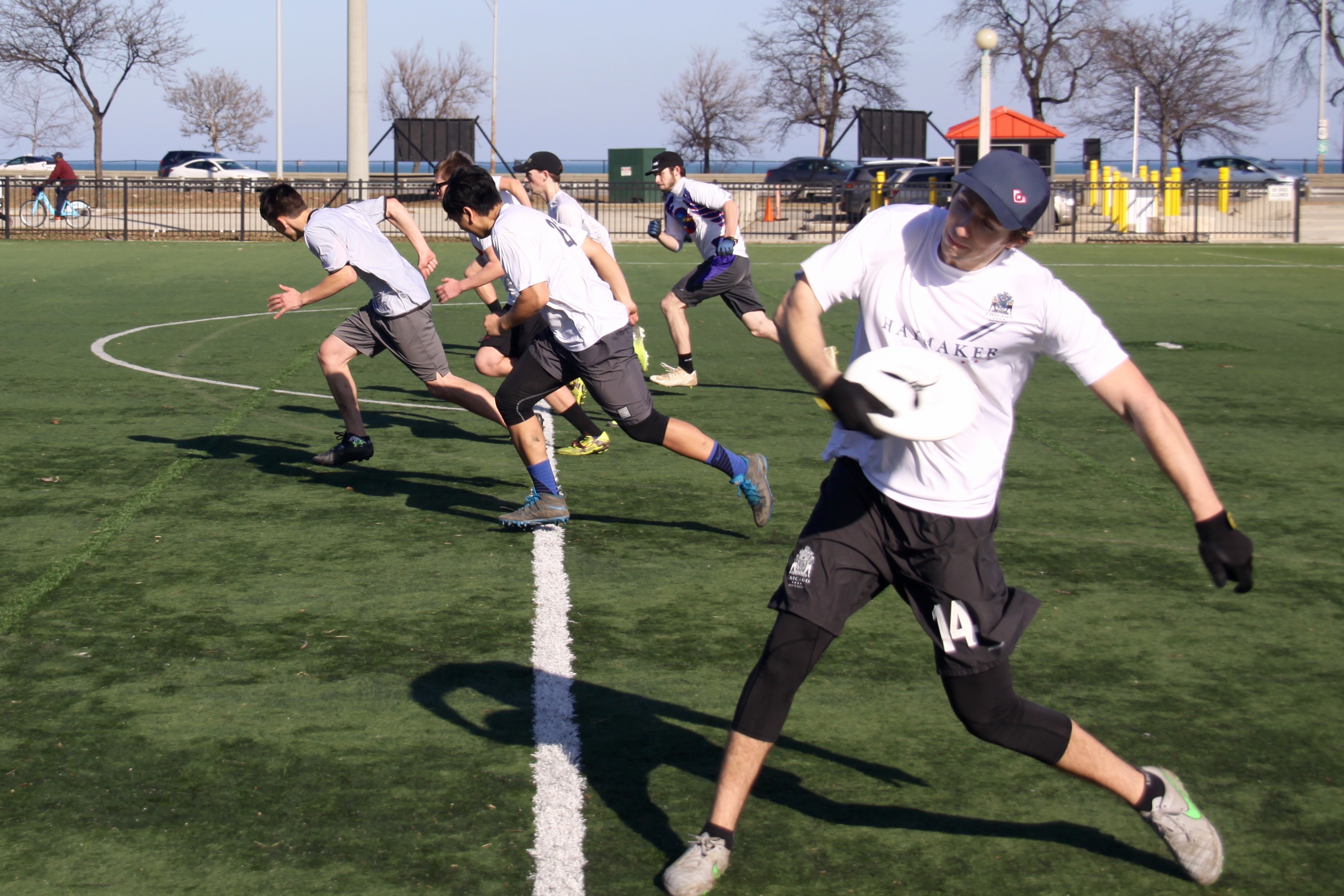 Tony Paoli throws a “pull” after his side scored during a scrimmage at a DePaul Ultimate Club practice on Jan. 21, 2017. (Photo/Ben Rains)