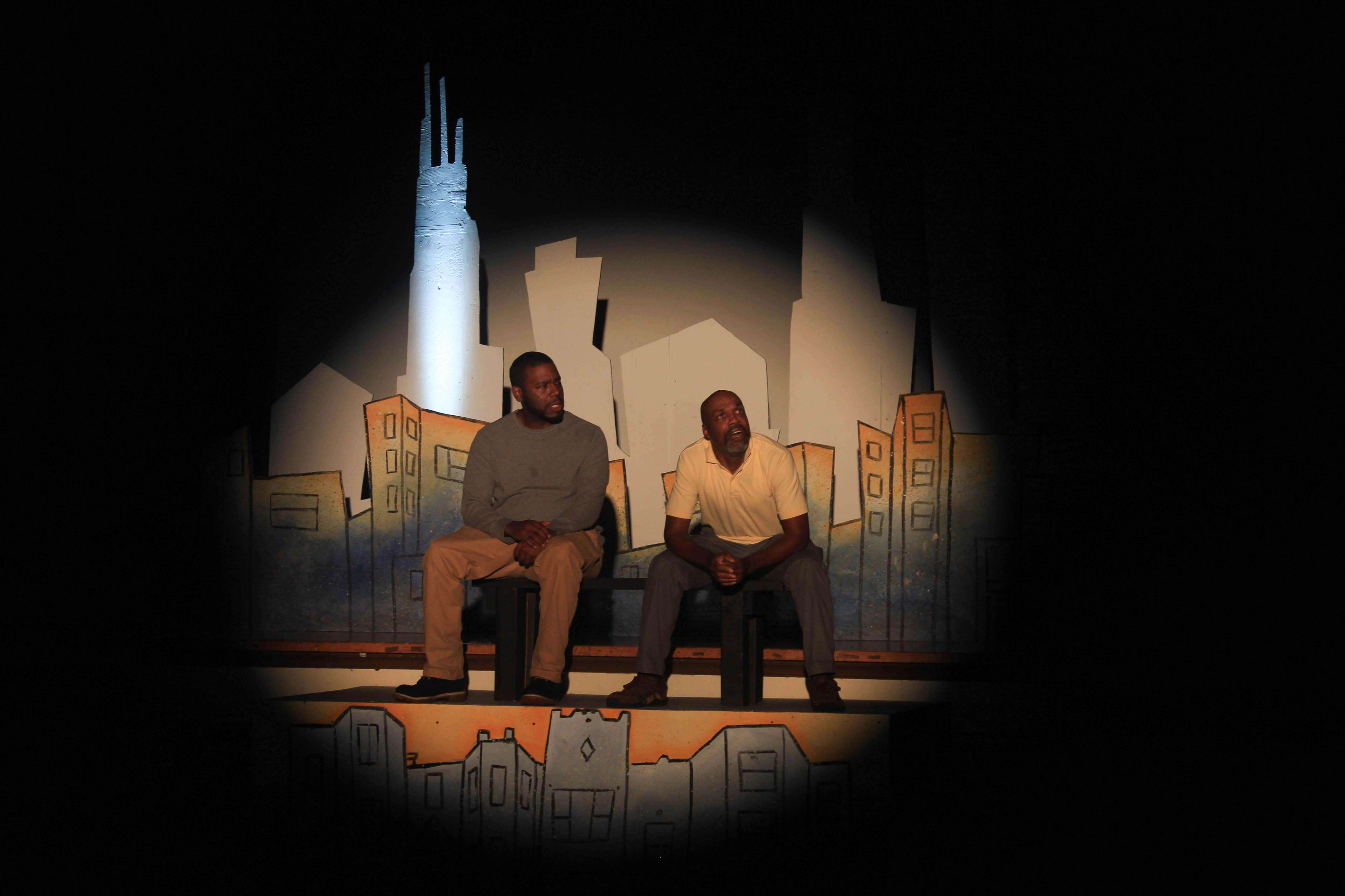 Kenneth Johnson and Brandon Boler discuss grief while waiting for a train in "Dandelions" (Meredith Melland, 14 East)