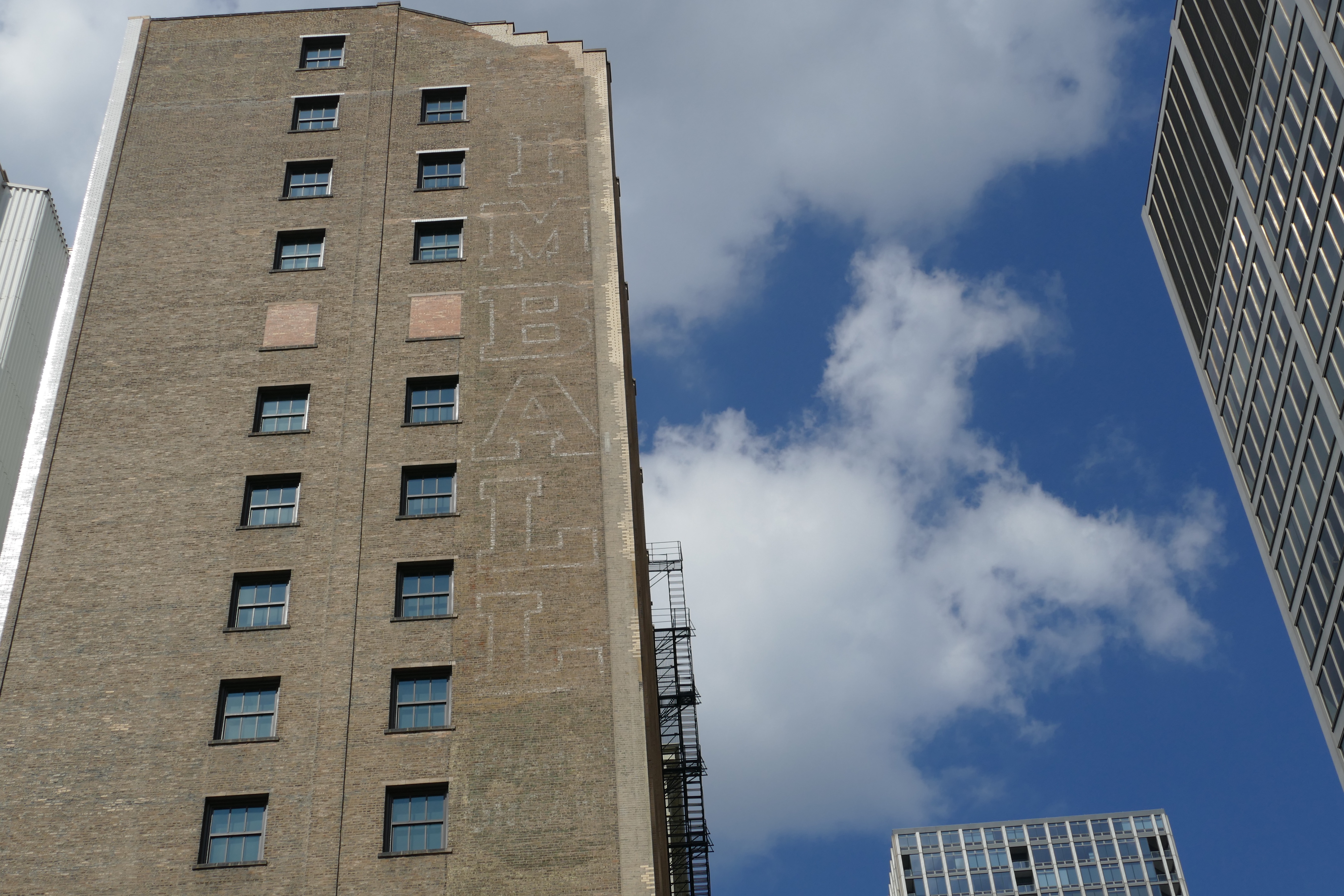 The faded W.W. Kimball advertisement on DePaul’s Lewis Center. (Photo courtesy of Marissa Nelson)