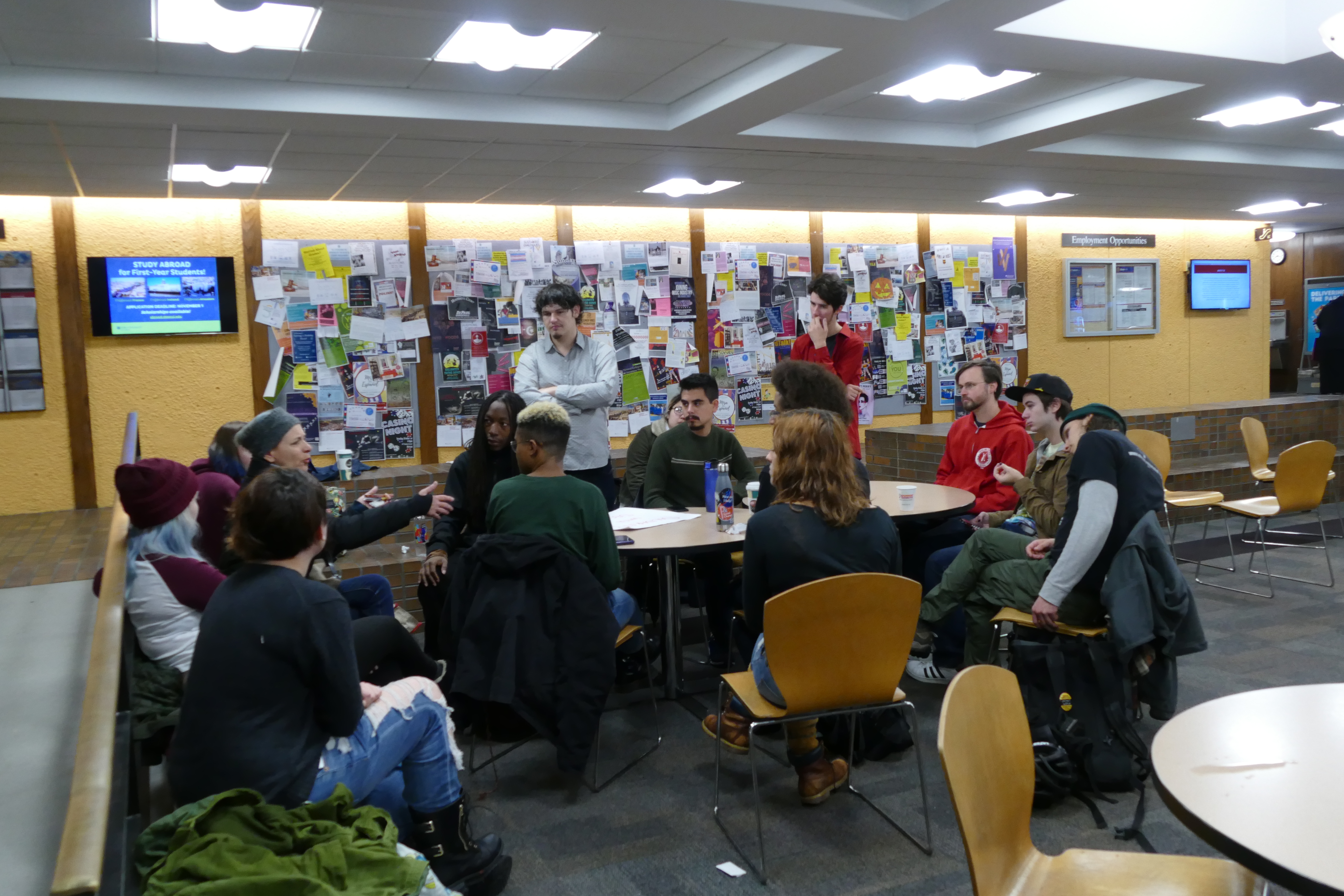 The DePaul Socialists engage in a discussion after the protest for Guardian workers Tuesday, Oct. 24. Photo: Marissa Nelson, 14 East.