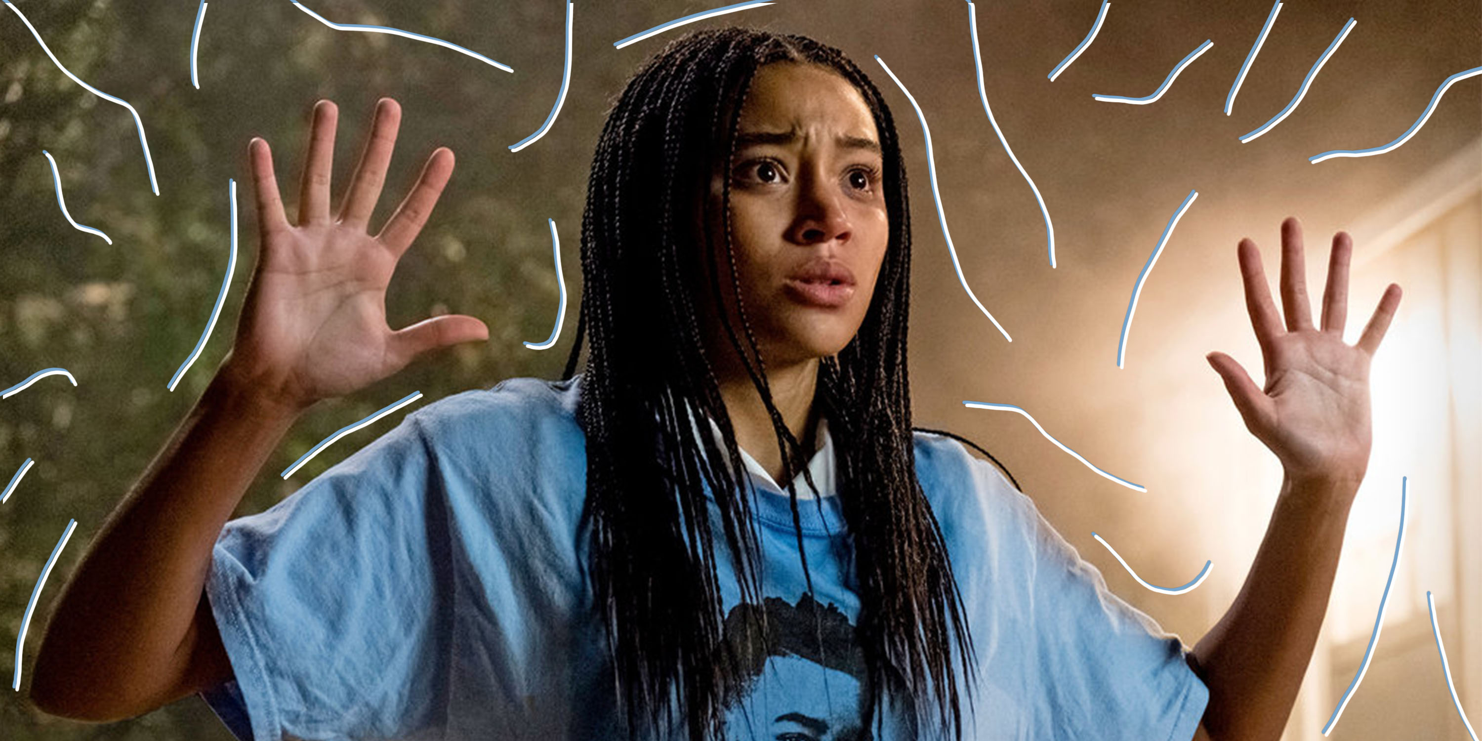 Starr (Amandla Stenberg) holding up her hands with teary eyes signaling "don't shoot."